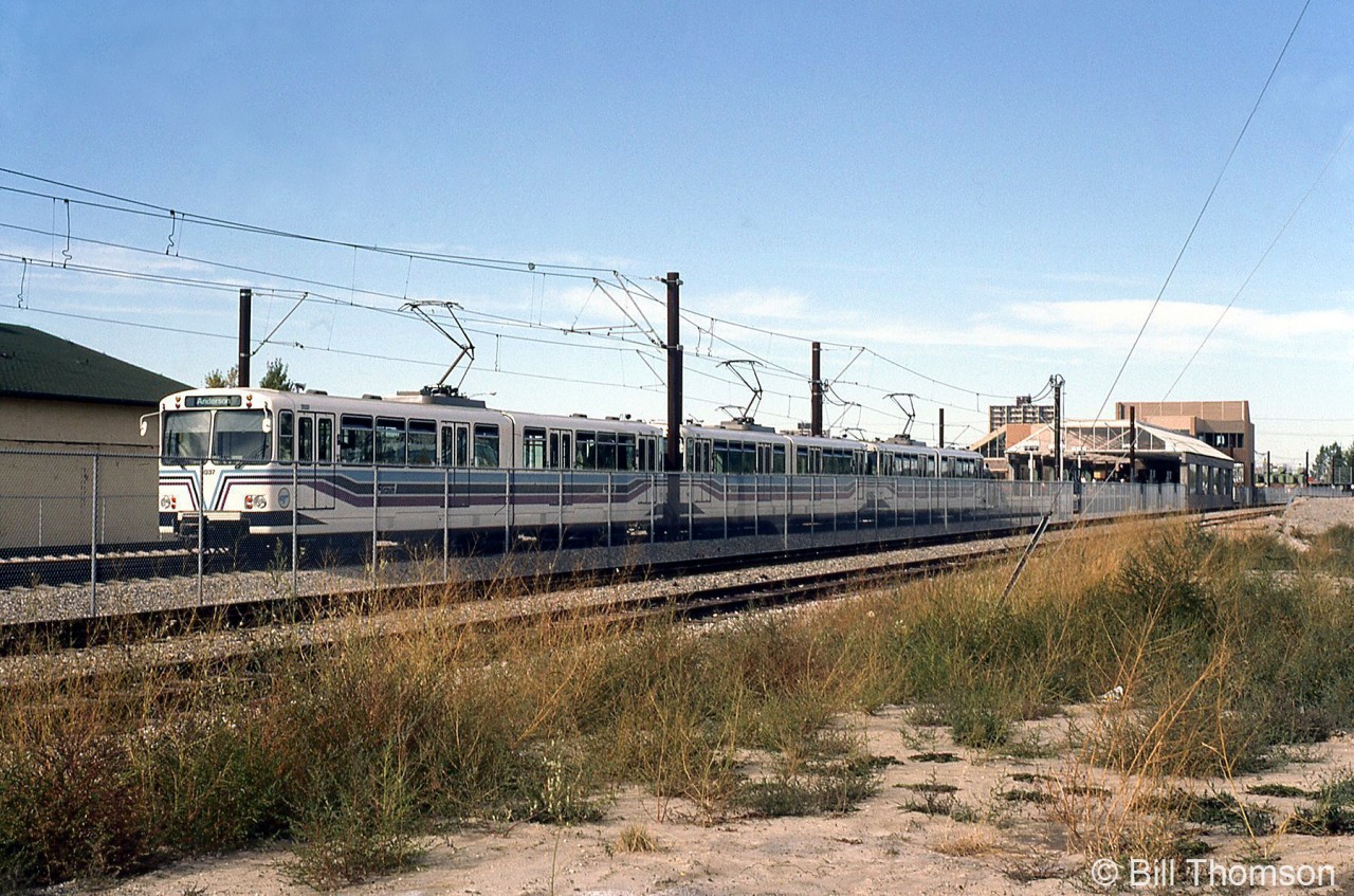 A six-car consist of Calgary Transit C-Train light rail cars is shown at Southland station in September of 1984. These are new German-built Siemens/DüWag U2 light rail cars built for Calgary's C-Train rapid transit system that started up in 1981. Car 2037 on the end is part of an order of new cars built in 1983-84.