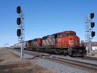 CN 501 shoves west through the new "Biggar East". The recently completed double-track program in the area has brought many changes to the area, one can only imagine how many changes the 5280 and mate 5276 have witnessed throughout the years. 