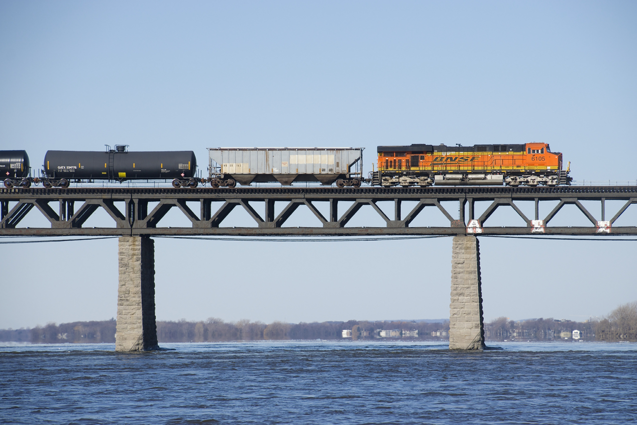 BNSF 6105 brings up the rear of loaded ethanol train CP 650, on its way to Albany as it crosses the St. Lawrence River.