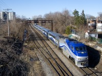 EXO 188 from Saint-Jérôme has AMT 1327 and six multilevel cars as it approaches North Jct which will take it from the Adirondack Sub to the Westmount Sub and see it switch directions from timetable south to timetable east.