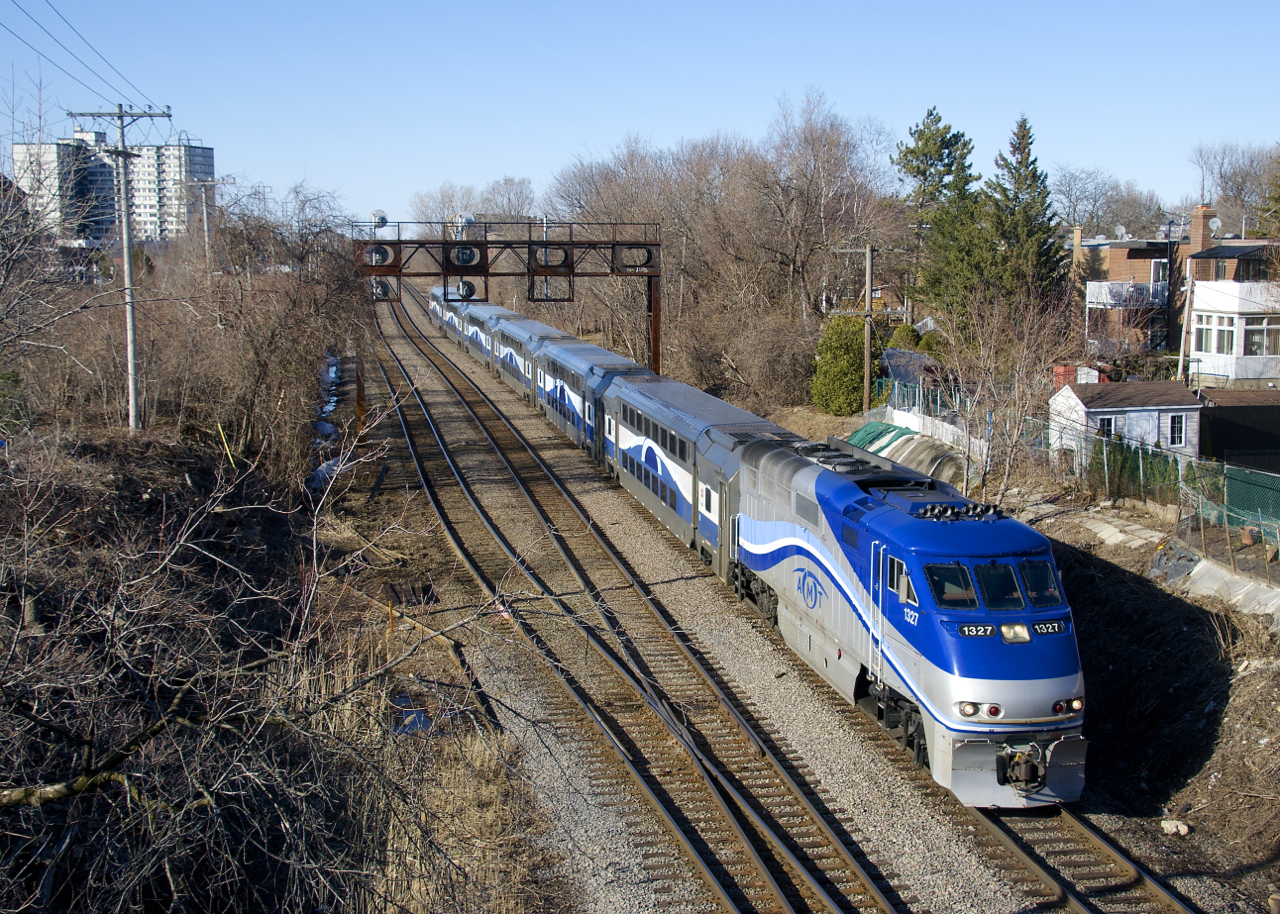 EXO 188 from Saint-Jérôme has AMT 1327 and six multilevel cars as it approaches North Jct which will take it from the Adirondack Sub to the Westmount Sub and see it switch directions from timetable south to timetable east.