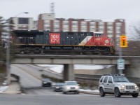 During the month of February rail blockades on the CN Kingston Sub made traffic patterns in Southern Ontario to be pretty sporadic at times.  I learned of CN 3231 leading on CN 396 on a grey February afternoon and not being too motivated to go for a drive I chose to walk outside of my apartment building and set up for a pan shot of the train crossing St Paul Avenue in Brantford.  The amount of new GEVOs on CN is making trains on the line pretty cookie cutter, so mixing it up a little seemed to be a good call.
