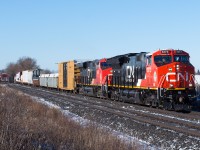 CN 394 blasts towards Bethel Church Road outside of Brantford with a brand new GE on point.  CN 3273 looked pretty sharp in the lead, I'm not a fan of all the GEVO's on CN these days, but the scheme looks great when new/clean.