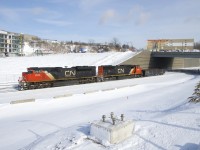 Originating at Southwark Yard, CN 321 has just passed Turcot Ouest with CN 8958, CN 5651 and just a single car and will go another 120 miles or so like this until it picks up its train at Brockville. In the wake of the blockade of CN's Kingston Sub, trains are still parked all over, some without power.