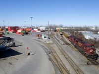 CP 143 with CP 8654 & CP 8041 is doing work at Lachine IMS Yard.