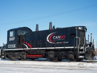 A rather clean CCGX 1007 soaks up the sun next to the CN Camrose Sub. This unit is one of a handful of Canada units assigned to Imperial's Strathcona Refinery which is directly behind me. The unit is exCP 1240 neeCP 8140. 