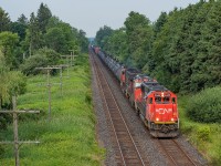The derailment in the Sarnia tunnel had happened the day prior, and 382 and 383 were the lifelines for traffic in and out of Sarnia in the days that followed. Here is one such 382, with CN 5443 on point for the eastbound trip to Mac. If memory serves, they lifted nearly 100 cars in Aldershot on the way.