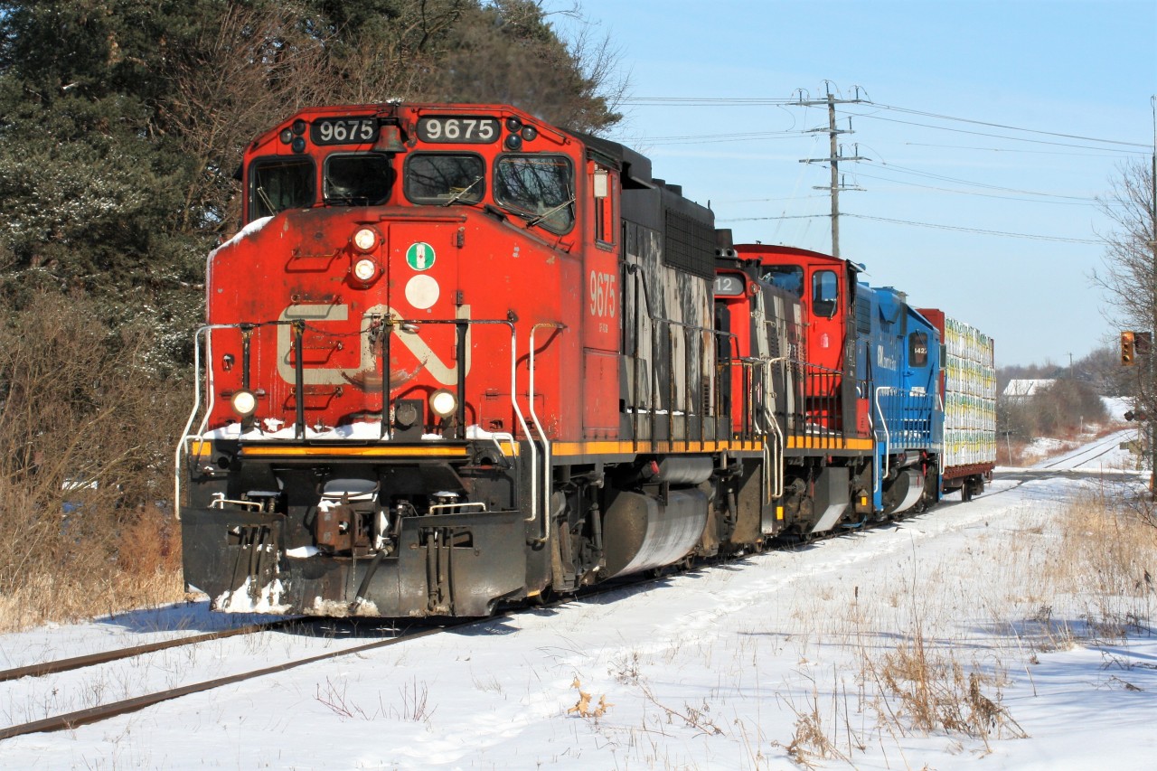 Probably one of my favorite consists from last year was this day when L568 was assigned a GP40-2(W) and a GMD1u, a truly only Canadian pairing. Here L568 heads westbound through Baden with one loaded bulkhead on the Guelph Subdivision with 9675, 1412 and GMTX 2289.