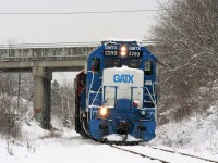 The calendar might say spring; however CN L568 is rolling through a winter wonderland on the Huron Park Spur in Kitchener as it approaches Madison Avenue. The train, powered by GMTX 2289, 7080 and 9675 had set-off cars at the interchange with Canadian Pacific in Kitchener as well as spotted one boxcar at Convoy Supply Limited. After returning on the spur light power to the Guelph Subdivision, the units would head westbound to Stratford. 