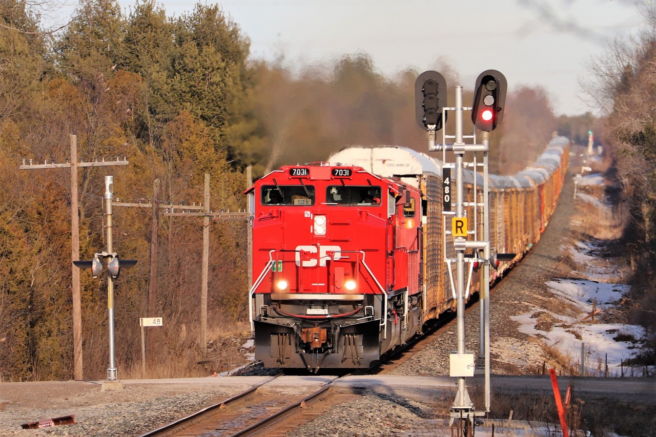 A pair of rebuilds in SD70ACu, CP 7031 and AC44C6M, CP 8021, lead a westbound CP 147 up the Galt sub blasting past Mile 48 after getting cleared by T69 at Galt. The newly rebuilt SD70ACu are making a nice change of pace lately from the regular dull CP's and have been regularly leading through here instead of being stuck trailing.