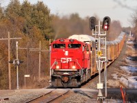 A pair of rebuilds in SD70ACu, CP 7031 and AC44C6M, CP 8021, lead a westbound CP 147 up the Galt sub blasting past Mile 48 after getting cleared by T69 at Galt. The newly rebuilt SD70ACu are making a nice change of pace lately from the regular dull CP's and have been regularly leading through here instead of being stuck trailing. 