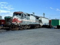 The Montreal, Maine & Atlantic was one of those railroads I wished had survived. It's very unfortunate the devastation that led to the railroads demise, and the collapse of Ed Burkhardt's railroad enterprise. He did an amazing job building a number of railroads into a success, from the small and little know SLC to  the Railfans favorite WC along with rail operations in Britain. It was unfortunate that the MMA was so far from my home or o would have visited more often. Thus day found Four axle Dash-8 8525 working the yard in Farnham, a long way away from the Burlington Northern lines it previously spent so many years roaming. Unlike MMA's C30-7'S, most of the Dash-8 would survive the demise of the MMA and eventually move onto new owners. 

