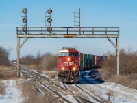 In keeping with the theme of <a href="http://www.railpictures.ca/?attachment_id=40462" target="_blank">a late 143</a>, I came across another one Sunday morning and gave chase. I scoped out Vinemount but the angle of the sun wasn't favourable, so instead I shot it in Smithville and then again here at CN Robbins where they are pictured on the Cayuga Spur coming off the CP Hamilton Sub and onto the CN Stamford Sub for the remainder of the journey to the border. They made good time from Smithville to Robbins, as I barely made it here ahead of them. Far in the distance you can see the bridge in Dain City, which <a href="http://www.railpictures.ca/?attachment_id=27323" target="_blank">many others</a> have included in their shots over time.