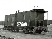 One of Canadian Pacific's rare bay window cabooses sits in the joint CN-CP yard. It is used when the yard job(Classified as a road switcher) goes to Winfield 15 miles north of Kelowna