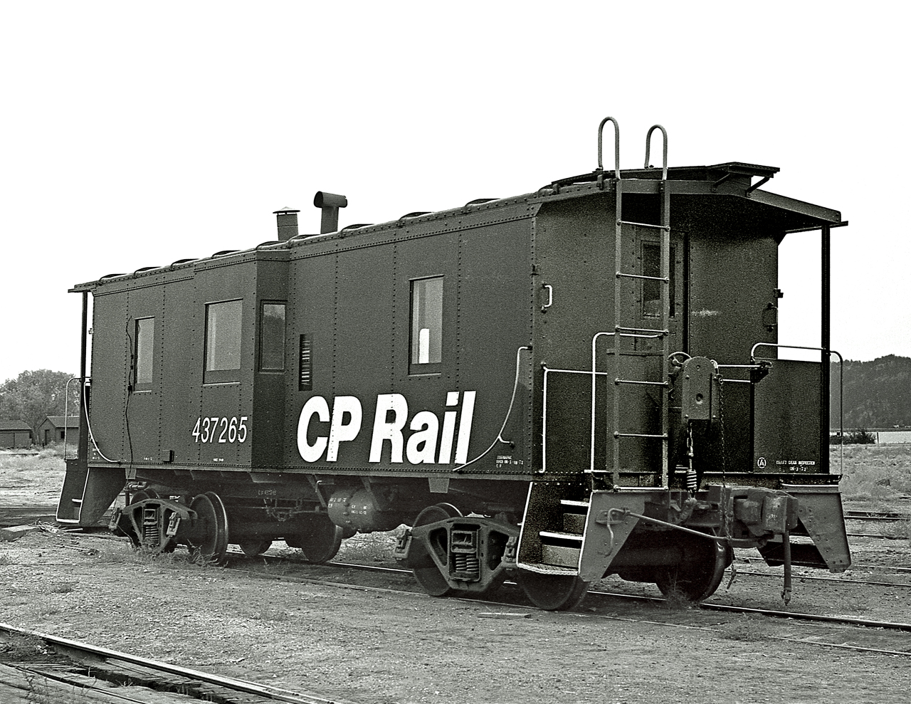 One of Canadian Pacific's rare bay window cabooses sits in the joint CN-CP yard. It is used when the yard job(Classified as a road switcher) goes to Winfield 15 miles north of Kelowna