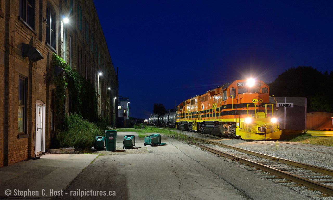Near the summer solstice in 2018 I took my chances on the GEXR 584 departing with enough light to shoot and I got lucky.  I kept chasing all the way to Elmira to see what I could do. When it gets dark you have to pray the train stops, and somewhere good - this was where they stopped and in the brief minute or two of the train being motionless I was able to capture this scene. They are switching Lanxess in Elmira, crazy winds had blown over the municipal garbage bins earlier in the day - at least they weren't on the tracks.