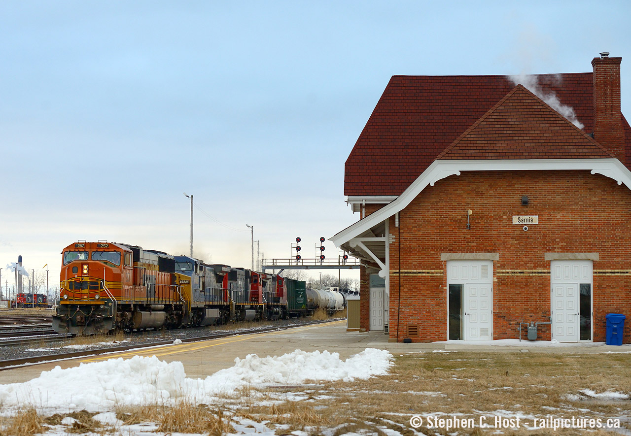 Another of my "stand up when it happens" moments during the CN 'leaser' era which has largely ended (except the 4 axle units, still here as I type this). I had to get this, had word from a friend (Thanks eh Tim) that this was coming and I had to do was leave my in-laws, and just wait for it in the cold. It my one and only shot at PRLX orange in the lead, of course it was on a local and it didn't go past Sarnia. There have been so many moments like this, in good 'ol Sarnia. So who's going to Sarnia? See you there :)