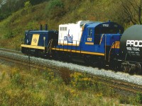 My dad had gone to Copetown this day to photograph trains on the Dundas Subdivision that were passing the empty space where normally the Inksetter Road bridge would be. At the time, the bridge was undergoing a complete overhaul and the road was closed at each end, making Copetown an even quieter spot for road traffic while the construction was happening. That day he shot the usual trains as would have been seen at the time, including NS 327 and NS 328, however there was one he photographed I wish I had been there for. It was a westbound Southern Ontario Railway (SOR) train with RLK 1200 and RLK 1752 heading-up the grade with cars for either Brantford or Paris from Hamilton. He does have photo of them returning as light power some-time after, so I imagine they set the cars off in Brantford and headed back east. This was the only time I had ever seen photos of SOR taking an actual train up the grade from Hamilton on the Dundas Subdivision; however it might have happened prior and maybe others on this site have even seen it.  Also, if anyone has any additional information on this move it would be appreciated and I also wish I had the exact date.

