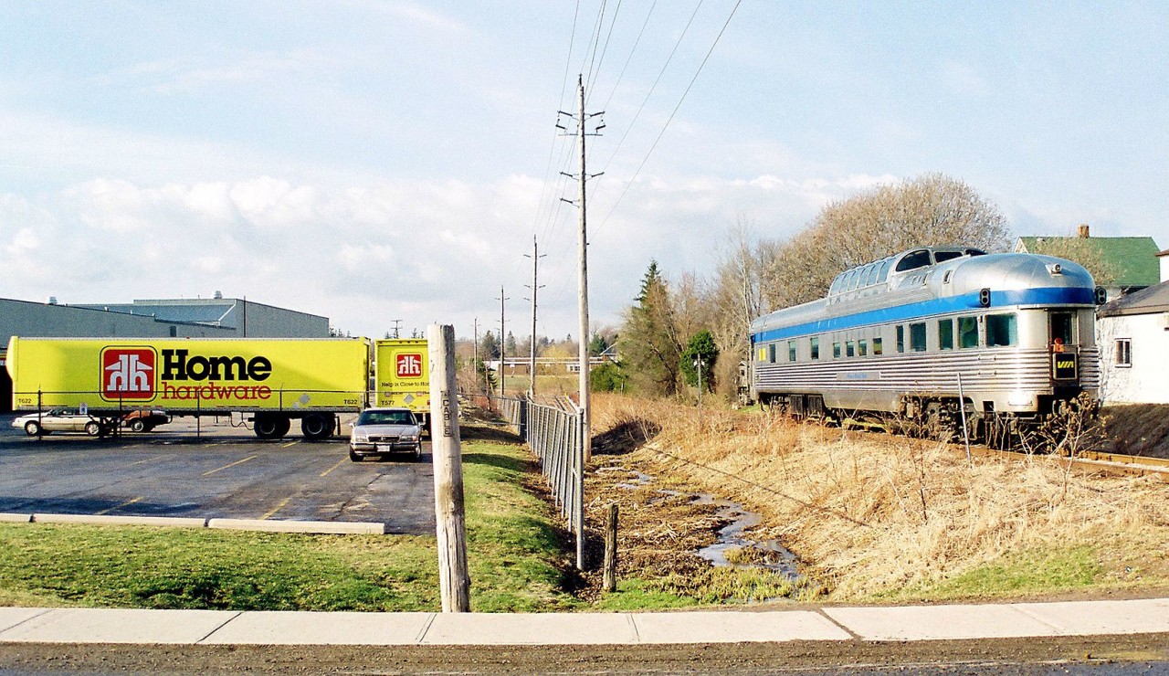 During 1997, Home Hardware and VIA Rail were in the midst of an aggressive marketing campaign on television, radio and in the print media as Internet journalism was still not yet invented. So in much simpler times, the best advertising was doing something unique to both brands. So, what better way to capture attention during Home Hardware's and VIA Rail's "Win a Train Trip Across Canada" promotion then to actually bring a piece of the Canadian to Home Hardware headquarter's itself. So the CN 15:30 Kitchener job hauled VIA dome observation car "Prince Albert Park" up the Waterloo Spur to St. Jacobs where it would spend the weekend near the Home Hardware facility. The car was lifted the following week by the same CN assignment and unfortunately both moves to and from Kitchener on the Waterloo Spur were under the cover of darkness.