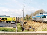 During 1997, Home Hardware and VIA Rail were in the midst of an aggressive marketing campaign on television, radio and in the print media as Internet journalism was still not yet invented. So in much simpler times, the best advertising was doing something unique to both brands. So, what better way to capture attention during Home Hardware's and VIA Rail's "Win a Train Trip Across Canada" promotion then to actually bring a piece of the Canadian to Home Hardware headquarter's itself. So the CN 15:30 Kitchener job hauled VIA dome observation car "Prince Albert Park" up the Waterloo Spur to St. Jacobs where it would spend the weekend near the Home Hardware facility. The car was lifted the following week by the same CN assignment and unfortunately both moves to and from Kitchener on the Waterloo Spur were under the cover of darkness.  
