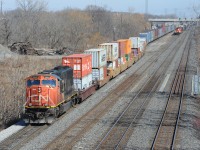 Just over two hours earlier, CN 5640 passed this point as east-facing trailing unit of CN 422.<br>
Presumably wye'd at Bayview, it now powers CN Extra 421 which is moving slowly toward CN Snake.<br>
It will follow the "real" 421 (A421 lead by IC2719,CN8928,CN2594,IC1026) which is on track 1 overtaking X421.
