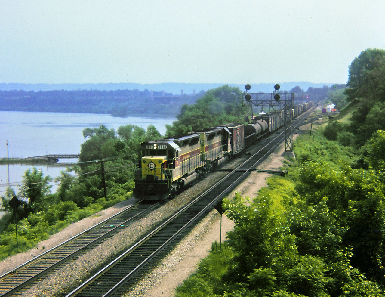 Late June and early July 1972 saw numerous detour trains from south of the border account damages from Hurricane Agnes. Pictured here is an Erie Lackawanna detour having departed Hamilton (TH&B) and is east bound on the CN Oakville sub. Most likely this train went to Montreal and then back to the USA. My Kodak Instamatic did it's best to capture the scene.
