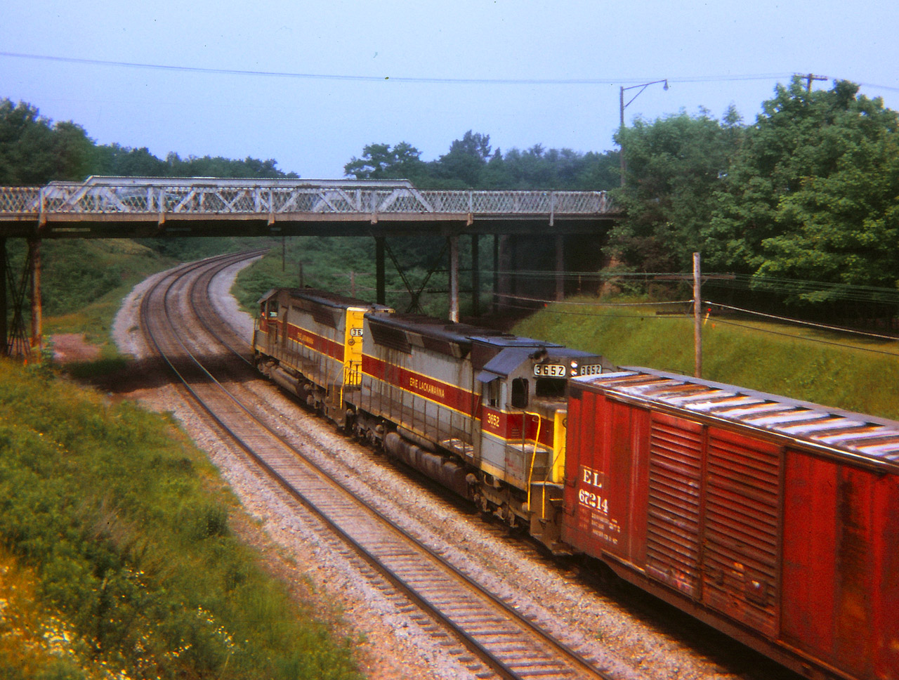 A view of a Erie Lackawanna detour train east bound on the CN Oakville sub. If I recall this train had departed from the TH&B and was heading east to perhaps Montreal for routing back to the USA. It was a busy time for the local railfans.  Another "Kodak Instamatic Moment" from long ago.