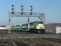 About a mile east of London station, GOT 558 leads 3 GO Transit bilevel coaches eastbound on the Dundas Sub. <br> Less than half the usual GO train length and a long way west of their usual GTA commuter routes.<br>
However it is heading for Toronto Union station, just like many morning GO trains.<br><br>
Apparently this is a scheduled VIA train operating with borrowed GO Transit equipment, during a period when VIA's LRC coach fleet was "grounded" for axle replacement.