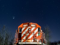 <b>Candy Stripes Under The Stars</b> 
SD40-2 5871 slumbers beneath the stars at Waterdown North on Canadian Pacific's Hamilton Subdivision. Once used to service the sprawling Barnes Industrial Complex (Opta Minerals), today, this siding is very seldom used and has quite literally fallen out of service. The rails, with their varying gauge, date back to the 1930s. To my knowledge, this was the first time a train had plied the rickety siding at Waterdown North since Barnes stopped receiving rail service five or so years ago. A pair of SD40s added an additional level of intrigue to a scene not likely to be repeated anytime soon.