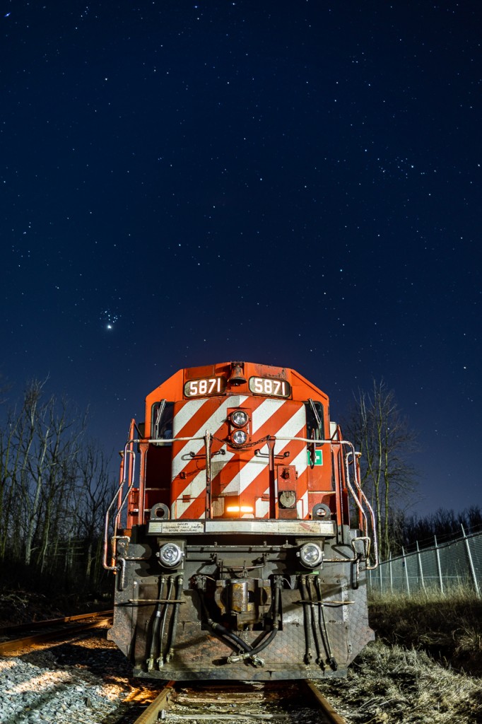 Candy Stripes Under The Stars SD40-2 5871 slumbers beneath the stars at Waterdown North on Canadian Pacific's Hamilton Subdivision. Once used to service the sprawling Barnes Industrial Complex (Opta Minerals), today, this siding is very seldom used and has quite literally fallen out of service. The rails, with their varying gauge, date back to the 1930s. To my knowledge, this was the first time a train had plied the rickety siding at Waterdown North since Barnes stopped receiving rail service five or so years ago. A pair of SD40s added an additional level of intrigue to a scene not likely to be repeated anytime soon.