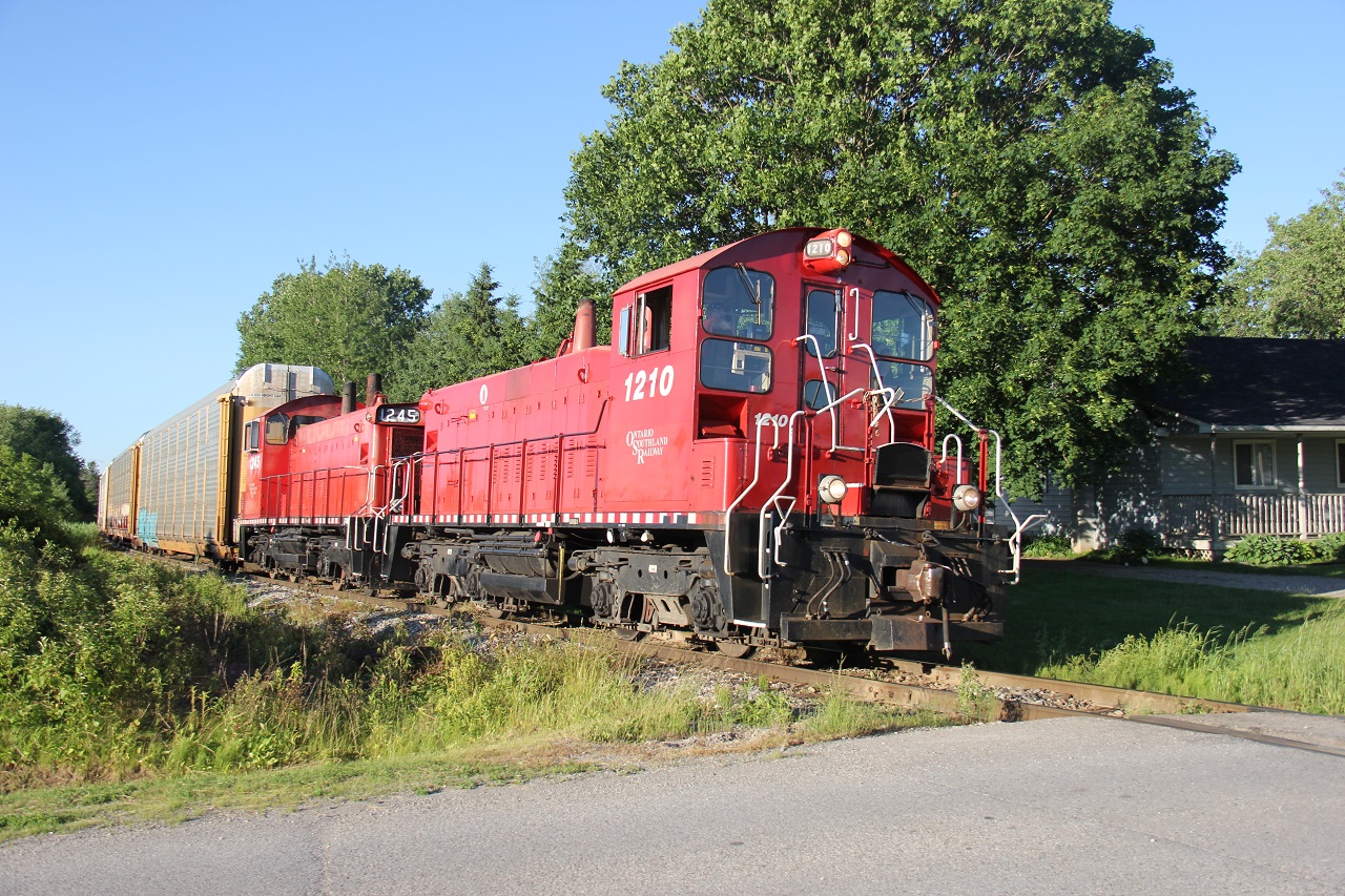 A pair of SW1200RSs (if I got that correct), numbers 1210 and 1245, lead a string of autoracks at the west end of Ingersoll on a beautiful summer solstice. I'm really glad I appreciated this time. And Ingersoll was hopping with activity that evening - all you could hear were horns going off left right and centre!