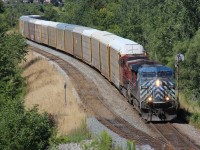 A CP westbound led by CEFX 1059 is pictured leaving Coakley siding in Woodstock westbound for London.