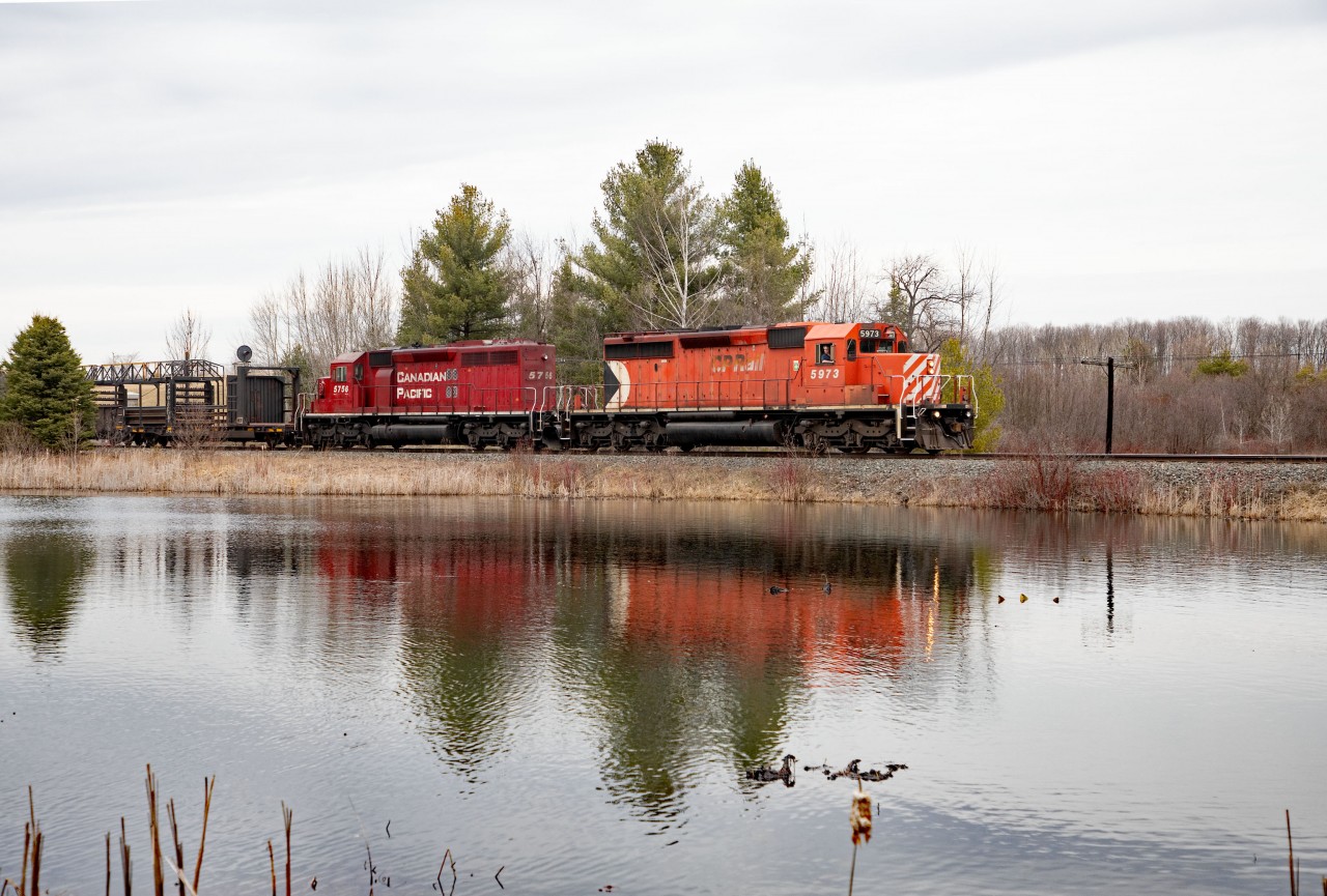 An alert that a pair of my favourite type of locomotives were heading south on a CWR train was more than enough reason to get out of the house.  Social distancing is pretty easy when railfanning, and apart from a great conversion across a road, I was on my own.  Local knowledge is always great, and a last minute decision to change locales seemed to pay off.  The CWR train sounded great, and even with the second unit dead, the hogger seems to be enjoying the trip. Window wide open and the sounds of a real unit.
