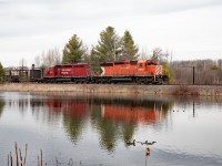 An alert that a pair of my favourite type of locomotives were heading south on a CWR train was more than enough reason to get out of the house.  Social distancing is pretty easy when railfanning, and apart from a great conversion across a road, I was on my own.  Local knowledge is always great, and a last minute decision to change locales seemed to pay off.  The CWR train sounded great, and even with the second unit dead, the hogger seems to be enjoying the trip. Window wide open and the sounds of a real unit.     