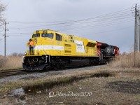  A strange turn of events today in Sarnia gave me the opportunity to catch one these EMD SD70ACe T4 Demonstrators leading although technically it is the trailing unit. X149 was held at Camlachie Sideroad because its power (IC 2458 and CN 2507) were not PTC equipped so they were not allowed to lead into the US. X149 came in light power and was swapped with what I believe was 482's power which is the EMDX 7201 Demo and CN 3200. So far these Demonstrator units have not led that I know of and today was no exception as this power had to wyed before being taken back out to lead X149 with the CN 3200 leading. Here they make their way around the west leg of the wye in Sarnia. Despite the dreary conditions these units sure stick out.