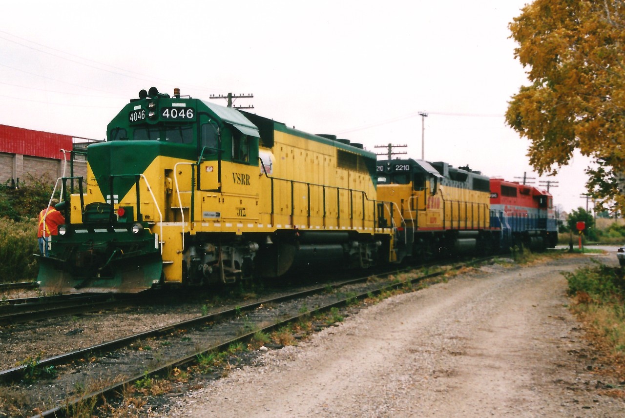 Goderich-Exeter Railway train 431 has just completed it's set-off at the Kitchener yard and is returning to it's cars left on the mainline for the rest of the trip west to Stratford. The consist included; RLK 4096, LLPX 2210 and GEXR 4046. GP40 4046 was having a bit of an identity crisis as it's old VSRR lettering and numbers were starting to re-appear. VSRR were the reporting marks of the Virginia Southern Railroad and was home to 4046 prior to being transferred in late 1998 to GEXR.
