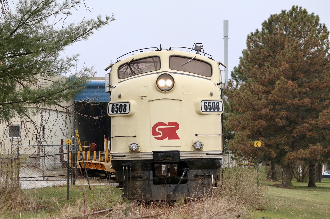 The dark and dreary weather only added to the mood of the day as OSR's "Cayuga Clipper" made some railroad history. This shot while maybe not the most scenic of the day probably meant a bit more to me then many others. For 22 years I worked for Adient / Johnson Controls in Milton until my plant shut down in 2019, so watching OSR serve the last Adient plant in Canada, located in Tillsonburg was a bit more somber for me. As the roll up door raised the crew grabbed a couple of ancient tank cars used over the years here as spacer cars, as locomotives are not allowed to enter the plant building. The train then lifted the last three tank cars spotted here filled with chemicals used in the production of automotive seating foam. Once this task was completed the train exited the spur and briefly reorganized its train of buffer cars, tank cars and MofW cars before heading back to the old CN yard on Tillsonburg's south side. After a re-crew and some last minute switching the train began its second last trip back to St. Thomas. Next weeks run should basically be a clean up run lifting all remaining cars left in town, but for Adient the last run has already occurred.