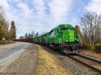 NBSR 6304, ex HLCX, leads a late New Brunswick Southern Railway eastbound freight approaching the car ferry at Grand Bay-Westfield, New Brunswick. 