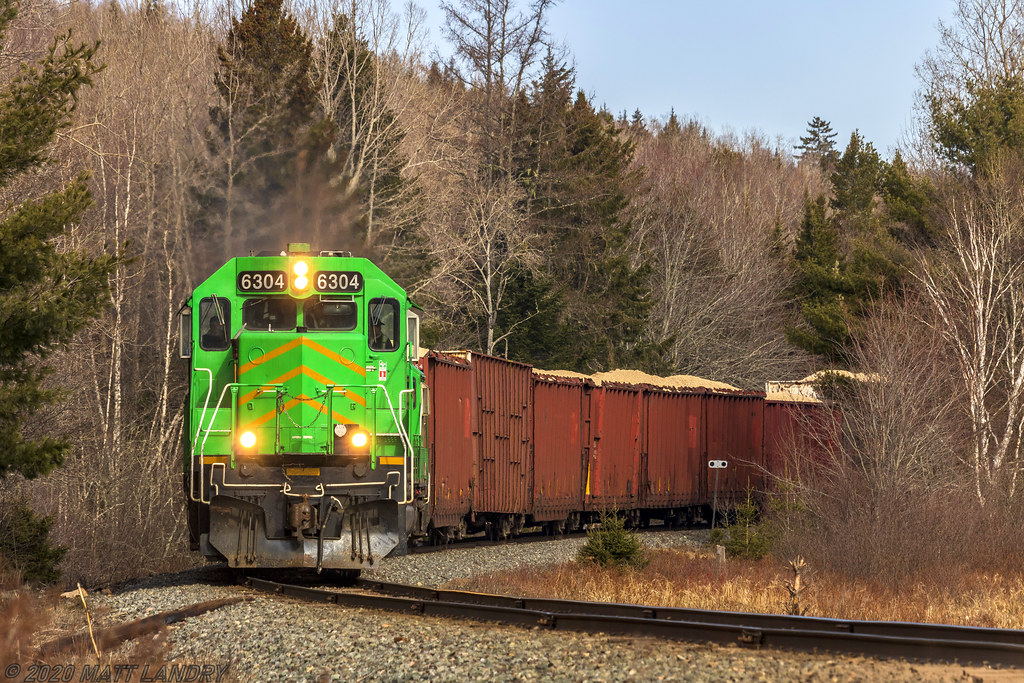 NBSR 6304 leads a late eastbound train 908, as they round the bend at Welsford, New Brunswick.