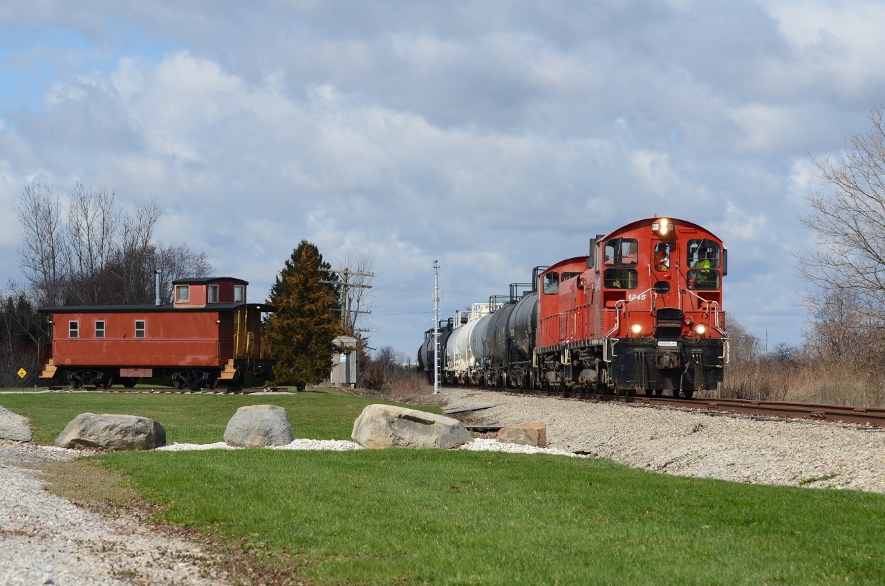 Sun playing tricks on me. OSR has strong plans to cease operations down CN’s Cayuga Sub by the end of the month meaning today as of April 9th 2020, will be its second out of fifth run as they operate the Tilsonburg job Thursday’s only. It’s truly crazy to know the history of rail lines and what traversed them in the past, this location is really one of them though that stands out as it was the scene of the diamond with the CASO and Cayuga Subdivisions. And now the only rail line that’s left in the scar of the busy diamond is coming to an end so thankfully, the sun cooperated for a nice scene with the refurbished caboose placed in between the 2 once busy lines. They crossed just behind this shot and you can still see the signal mast for the Wabash searchlight signal just behind the 2 SW 1200’s. The mast is now repainted and touched up in a bad way. At least in my opinion. The Cayuga Clipper will continue its slow run east towards Aylmer and Tilsonburg spotting on the way in Aylmer at the local ethanol industry. It would be unfortunate if all customers shut down as OSR ceases operation meaning the line is useless so it will most likely be torn up but who knows yet. Just gotta shoot it.