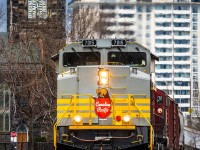 With Toronto to Buffalo tonnage on the drawbar, Canadian Pacific SD70ACU 7015 (nee 9126) puts the 'H' between the T&B as it guides train no. 246 through downtown Hamilton on the former TH&B. Pre-dating the construction of the railway by over a quarter-century, the striking MacNab Street Presbyterian Church towers over the TH&B as it has since the very beginning. 