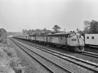 <br>
<br>
….dreaming of summers' past.....
<br>
<br>
...when F units were as common as.....your Mom's minivan..
<br>
<br>
...and Nikkormat's transported Kodak Plus X..
<br>
<br>
...and FPA-4's were uncommon on the transcontinental trains.....
<br>
<br>
  FP9A  /  F9B  /  FPA-4  
<br>
<br>
  6507  / 6627 / 6761   
<br>
<br>
  6507 to KCS #4 then to display Kansas City #34  / 6627 retired by 1990 /  6761 retired by 1989…
<br>
<br>
 ...the twelve car daily VIA Rail #9 is fresh off the CN Newmarket Subdivision ( Newmarket – Barrie – Orillia ) onto the CN Bala Subdivision …
<br>
<br>
..next operational stop CN Boyne to cross over to CP Rail at  Reynolds and onto CP Rail Parry Sound...
<br>
<br>
 ….at quadruple track CN Washago ( that is the Newmarket double track in the foreground), Kodak Plus X negative exposed August 5, 1985 by S.Danko
<br>
<br>
<a href="http://www.railpictures.ca/?attachment_id= 8405">  CN Boyne   </a>
<br>
<br>
<a href="http://www.railpictures.ca/?attachment_id= 8406">  switch key exchange   </a>
<br>
<br>
<a href="http://www.railpictures.ca/?attachment_id= 22413">  Orillia   </a>
<br>
<br>
sdfourty
