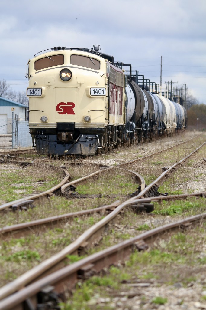 It is hard to imagine this is truly the end for this line. I know it's not 100 percent but might as well be. Watching the pair of matching "F" units clean up everything in the yard and leave town was certainly sombering. Fir the most part I missed the CN and CP days here. I first passed by the yard in Tillsonburg not long after Trillium took over for CN. A pair of worn and painted out CN M420's sat in the mainly empty yard with the old tobacco houses still standing trackside. As the years progressed the power and the yard itself gradually looked better. Unfortunately the future of the line only got more questionable as the years of passed, and maintenance became non existent. Unfortunately passing the torch from Trillium to to he OSR did little to secure the future and many Railfans came out today to witness the end. This shit for me sums it up best with all cars leaving town collected. The rest of the yard sits empty with greenery slowly already taking over. A few MofW cars stayed behind but reportedly they will be filled with rail to be used elsewhere on the OSR, and a small track mobile in a week or so will slowly push the cars over the out of service OSR bridge in town where OSR will lift them and put an end to rail operations in Tillsonburg's South end.
