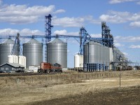 Northern Plains Railroad SD40-2 NPR 5906 and ex DMVW GP35, DMVW 6327, bask in the afternoon sun at the Gaudin Elevator east of Fort Saskatchewan.