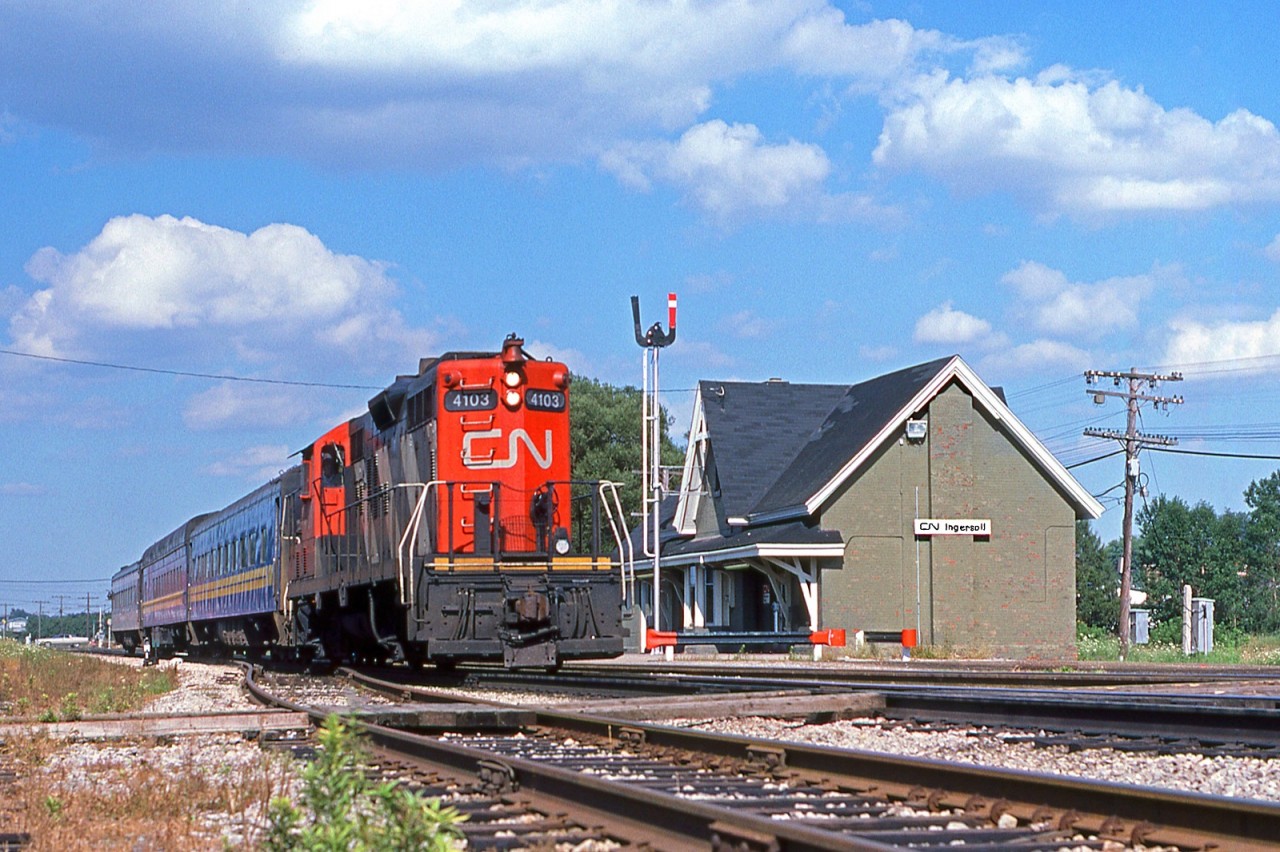 CN 4103 hustles VIA train 165 westward past the station at Ingersoll, mile 59 on the CN's Dundas Sub.