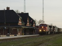 With the current pandemic happening and anything considered 'normal' having been thrown out the window, it was nice to get out and for once score a similarity to hockey's famed "hat-trick". This night's CN train 438, led by 5688 and IC 2465 in CN livery, cruises through comfortably after having lifted some grain cars by Keil Drive. Before this photo I was also able to shoot CP 141, running through Chatham at it's 'new time'. But, my third tally is shown in the distance. Parked in an unusual spot, was Saturday's power for 514 in the old venerable form of GP9 7025. I was surprised that 438 did not lift this engine, although it was gone the next morning by what assume was a lift made by 439 overnight. 