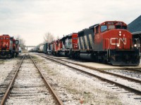 CN train 421 is departing Kitchener as it passes the CN offices and the VIA Rail station with 5273, 6016, 1375 and 4102. My notes show that 421 had set-off 9 cars before departing westbound at 18:45 ahead of the westbound VIA Rail #87. CN 4109 is seen to the left and was the assigned power for Guelph local 580. 

25 years later SD40-2(W) 5273 is still active and operating not too far from Kitchener assigned to Brantford as seen in these excellent photos.

 </a>

http://www.railpictures.ca/?attachment_id=40821

 </a>

http://www.railpictures.ca/?attachment_id=40693

 </a>


http://www.railpictures.ca/?attachment_id=39606

