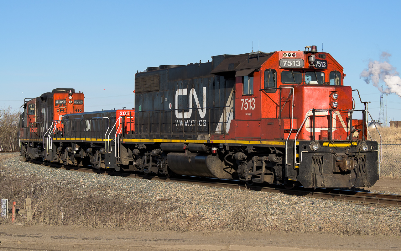Checking out what may have changed over the winter in the Clover Bar area, I found the 7513 making a lift out of the CN-CP exchange yard, located by the Suncor refinery. It is the 204 that caught my eye. I have not seen a slug in sometime now. In my 2019 East Edmonton travels, a typical consist was a combination of GP38's and 40's, no slugs. Happy to see the 7227 still working here, it was assigned to Clover Bar last summer.