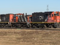 Not the most scenic spot, it is the power combination that brought me out of the car for a photo. Any assortment of units is good to go as long as it pulls it seems. I'm pretty happy just to snag a GMD-1 in action here in Edmonton. I don't imagine, unless a real stroke of luck, that the 1438 leads very often. To me, it is playing a roll of "slug with an engine" in this set up. LOL The crew appeared to be sorting out cars that will probably head out on later shifts for dispersal. 