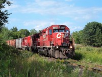 SD40-2 CP 5847 with a pair of SD40-2s in tow, drag the set offs for OCR up the grade to the Jean Avenue Crossing. Once clear of the interchange lead switch, the conductor let gravity and the use of hand brakes do the work.